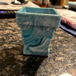 Blue and white swirled slag glass small vessel